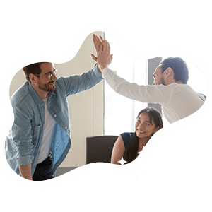 Diverse employees congratulate one another over the goals achieved and rewarded within the incentive program.